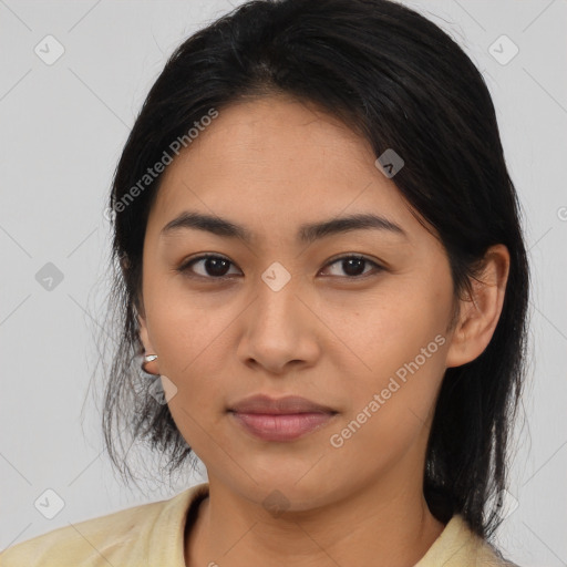 Joyful asian young-adult female with medium  brown hair and brown eyes