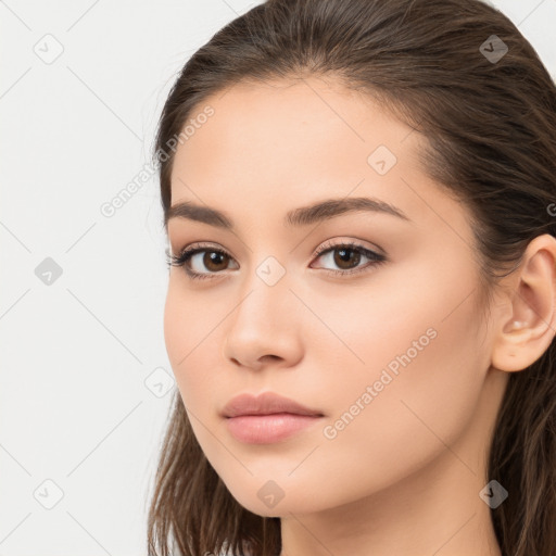 Neutral white young-adult female with long  brown hair and brown eyes