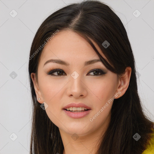 Joyful asian young-adult female with long  brown hair and brown eyes