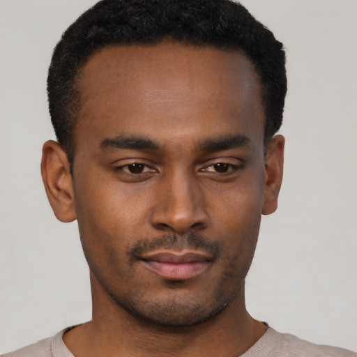 Neutral black young-adult male with short  black hair and brown eyes
