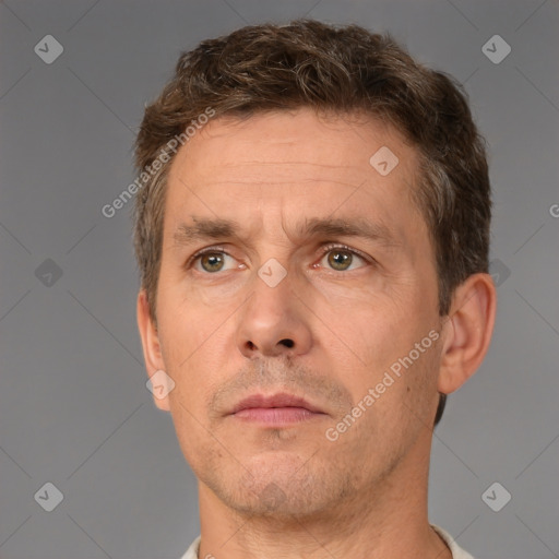 Neutral white adult male with short  brown hair and brown eyes