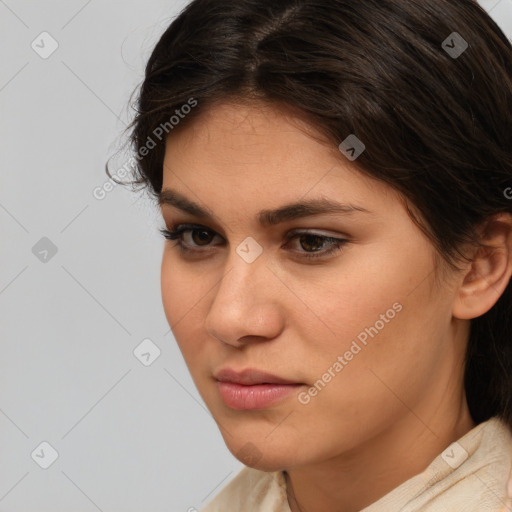 Neutral white young-adult female with medium  brown hair and brown eyes