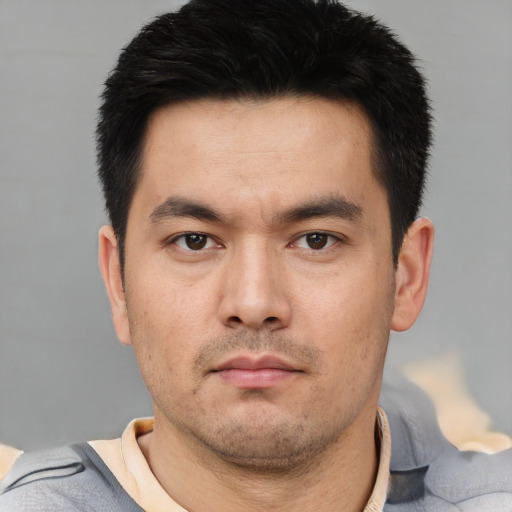 Neutral asian young-adult male with short  black hair and brown eyes