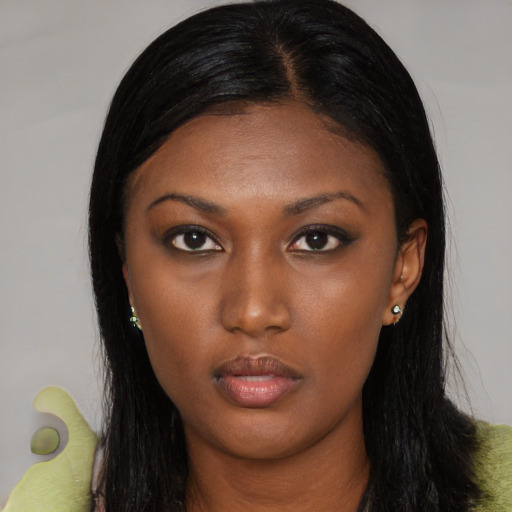 Neutral black young-adult female with long  black hair and brown eyes