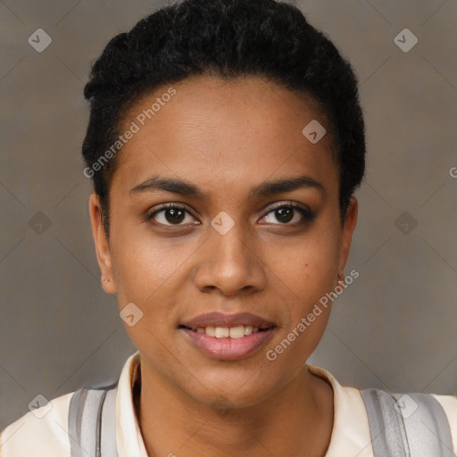 Joyful black young-adult female with short  black hair and brown eyes