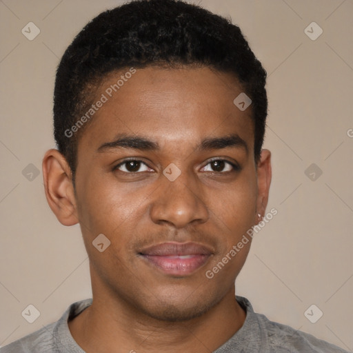 Joyful black young-adult male with short  brown hair and brown eyes