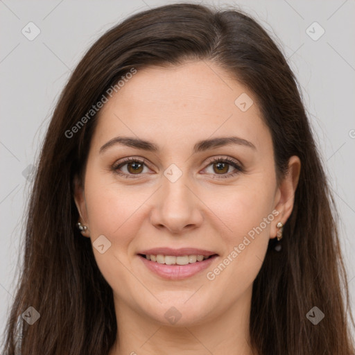 Joyful white young-adult female with long  brown hair and brown eyes