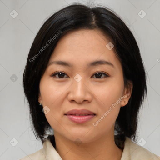 Joyful asian young-adult female with medium  brown hair and brown eyes