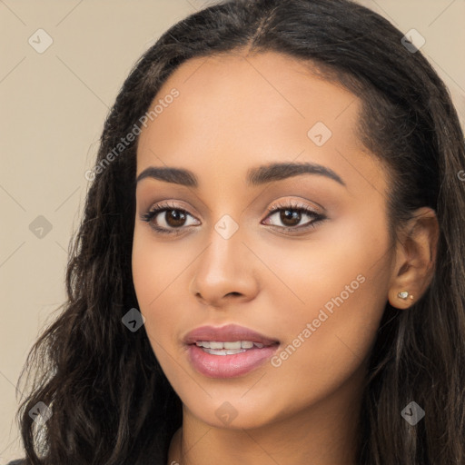 Joyful latino young-adult female with long  black hair and brown eyes