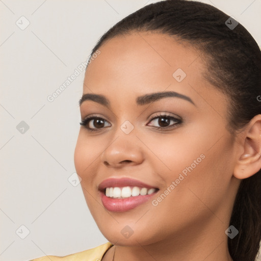 Joyful white young-adult female with long  brown hair and brown eyes