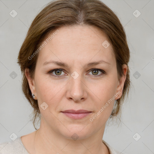 Joyful white adult female with medium  brown hair and grey eyes