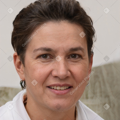 Joyful white adult female with short  brown hair and brown eyes