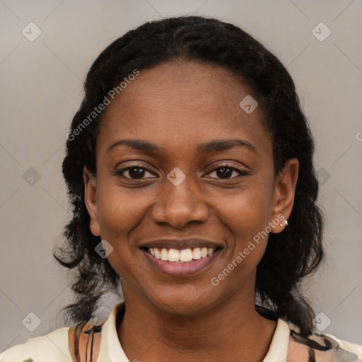 Joyful black young-adult female with medium  black hair and brown eyes