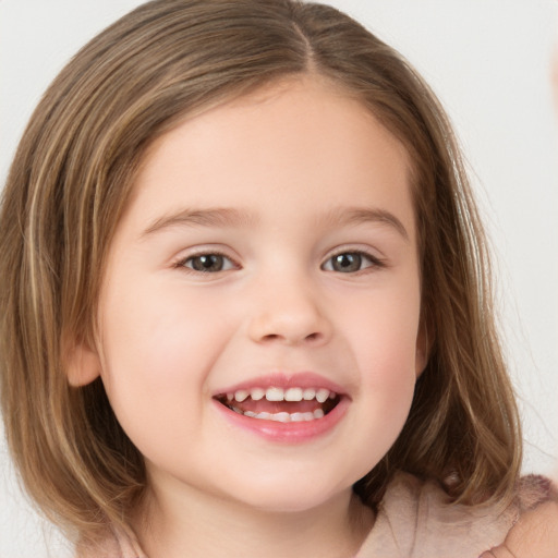 Joyful white child female with medium  brown hair and brown eyes