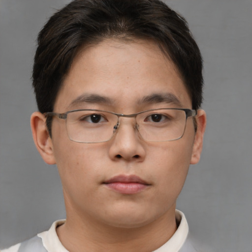 Neutral asian young-adult male with short  brown hair and brown eyes