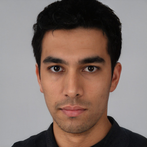 Neutral asian young-adult male with short  black hair and brown eyes