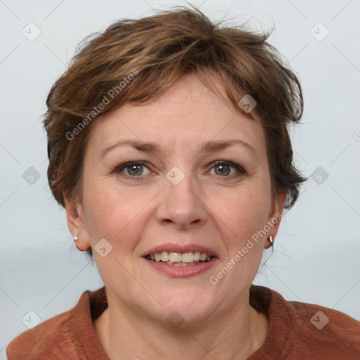 Joyful white adult female with medium  brown hair and grey eyes