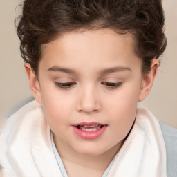 Joyful white child female with short  brown hair and brown eyes