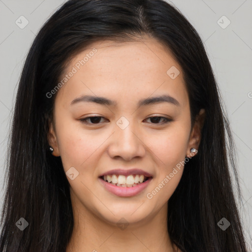 Joyful asian young-adult female with long  brown hair and brown eyes