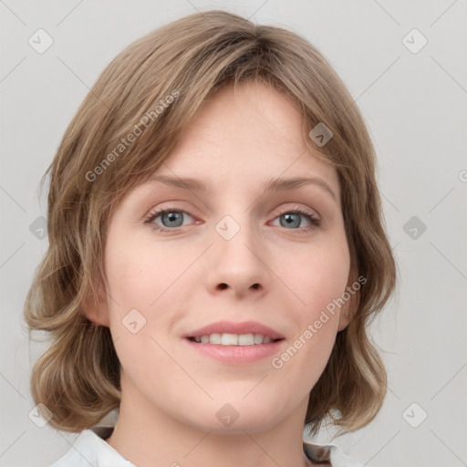 Joyful white young-adult female with medium  brown hair and blue eyes