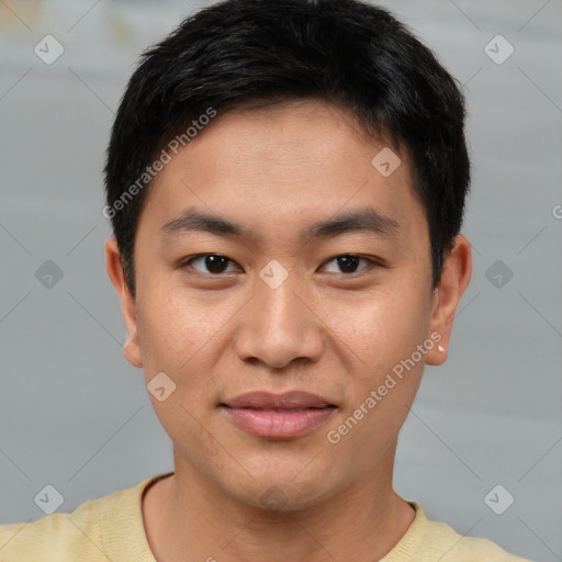 Joyful asian young-adult male with short  brown hair and brown eyes