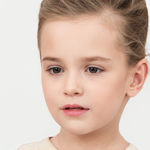 Neutral white child female with short  brown hair and brown eyes