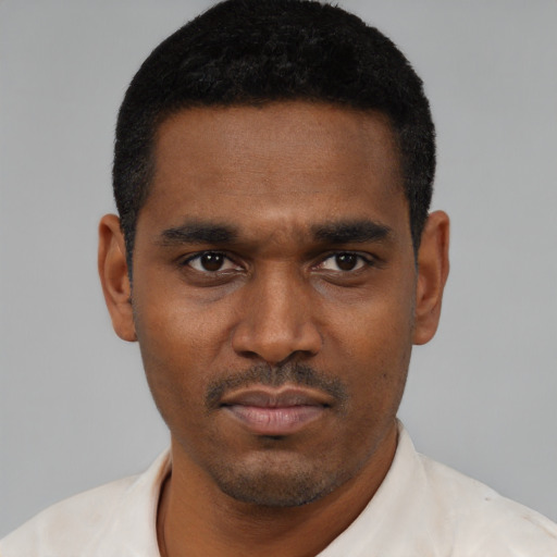 Neutral black young-adult male with short  black hair and brown eyes