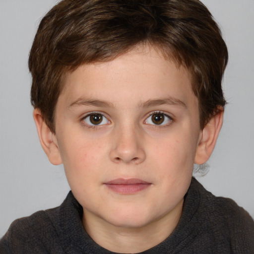 Joyful white child female with short  brown hair and brown eyes