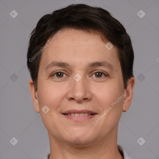 Joyful white adult female with short  brown hair and brown eyes