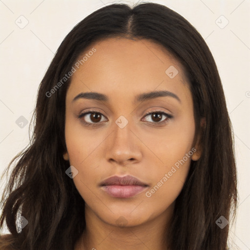 Neutral latino young-adult female with long  brown hair and brown eyes