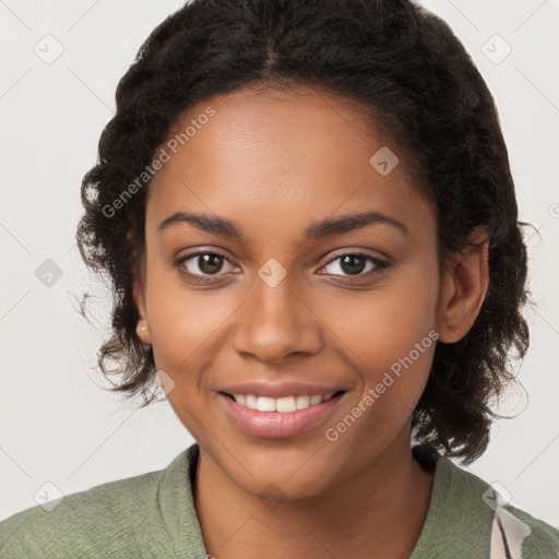 Joyful black young-adult female with medium  brown hair and brown eyes