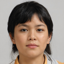 Neutral asian young-adult female with medium  brown hair and brown eyes