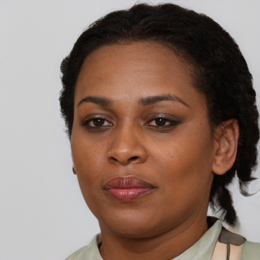 Neutral black young-adult female with short  brown hair and brown eyes