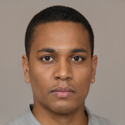 Neutral latino young-adult male with short  brown hair and brown eyes