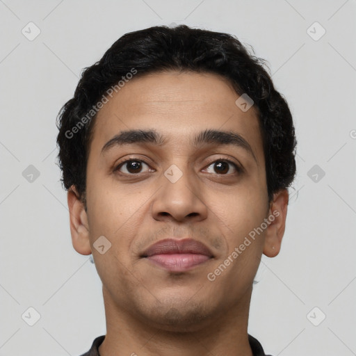 Joyful latino young-adult male with short  brown hair and brown eyes