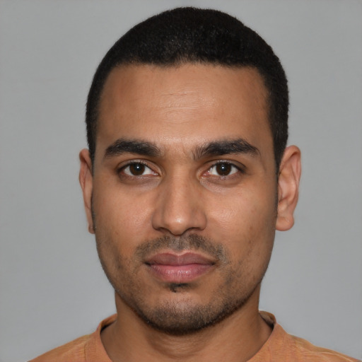 Neutral latino young-adult male with short  black hair and brown eyes