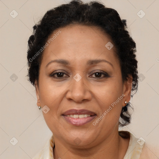 Joyful black adult female with short  brown hair and brown eyes