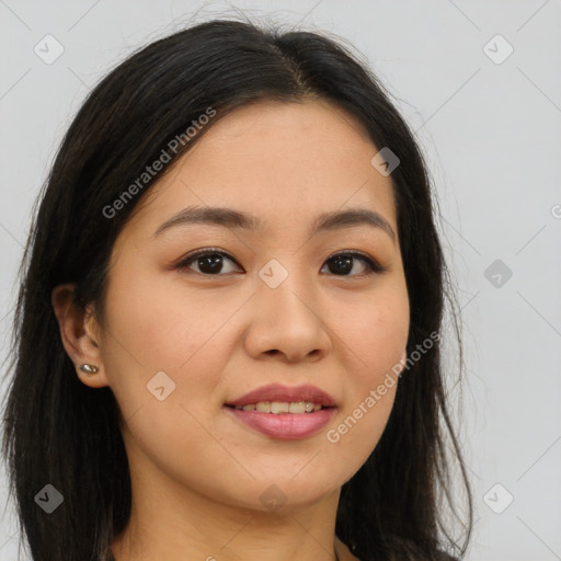 Joyful asian young-adult female with long  brown hair and brown eyes