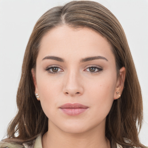 Neutral white young-adult female with long  brown hair and brown eyes