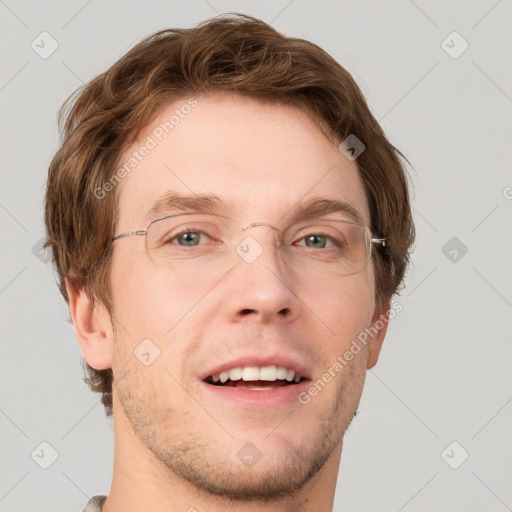 Joyful white adult male with short  brown hair and grey eyes