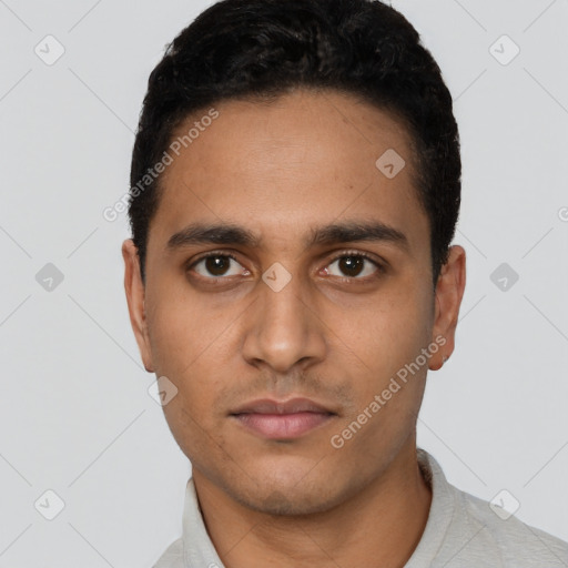 Neutral latino young-adult male with short  black hair and brown eyes