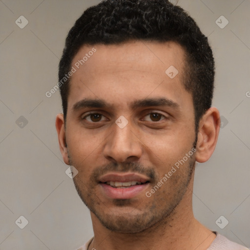 Joyful white young-adult male with short  black hair and brown eyes