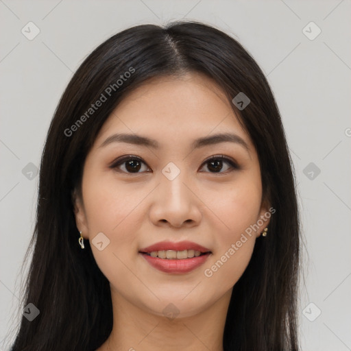 Joyful asian young-adult female with long  brown hair and brown eyes