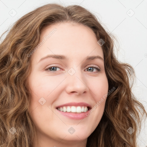 Joyful white young-adult female with long  brown hair and green eyes