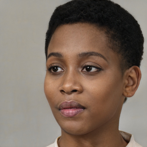 Neutral black young-adult female with short  black hair and brown eyes
