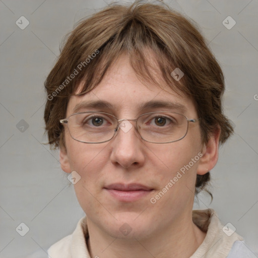 Joyful white adult female with medium  brown hair and blue eyes