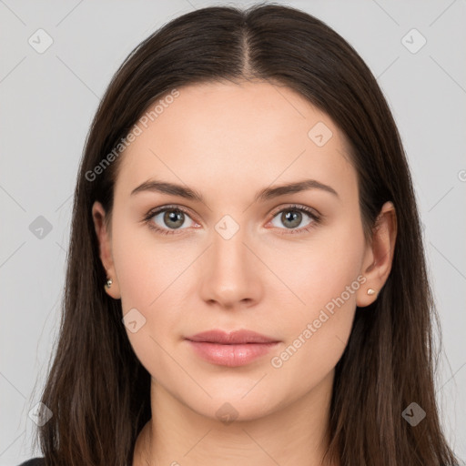 Neutral white young-adult female with long  brown hair and brown eyes