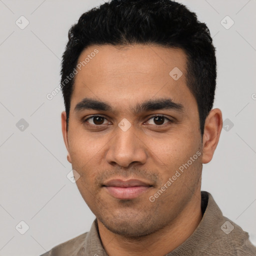 Neutral latino young-adult male with short  black hair and brown eyes