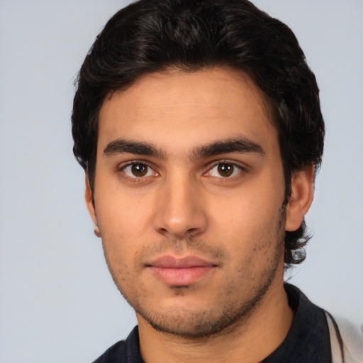 Neutral white young-adult male with short  black hair and brown eyes