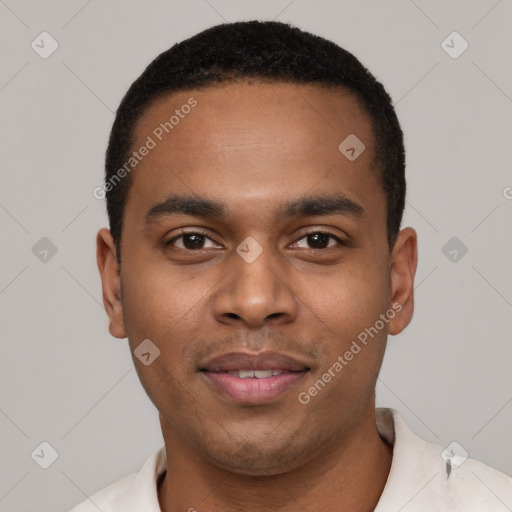 Joyful black young-adult male with short  black hair and brown eyes